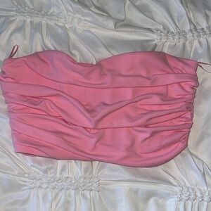 Bright pink mini strapless top with ruffle like pattern